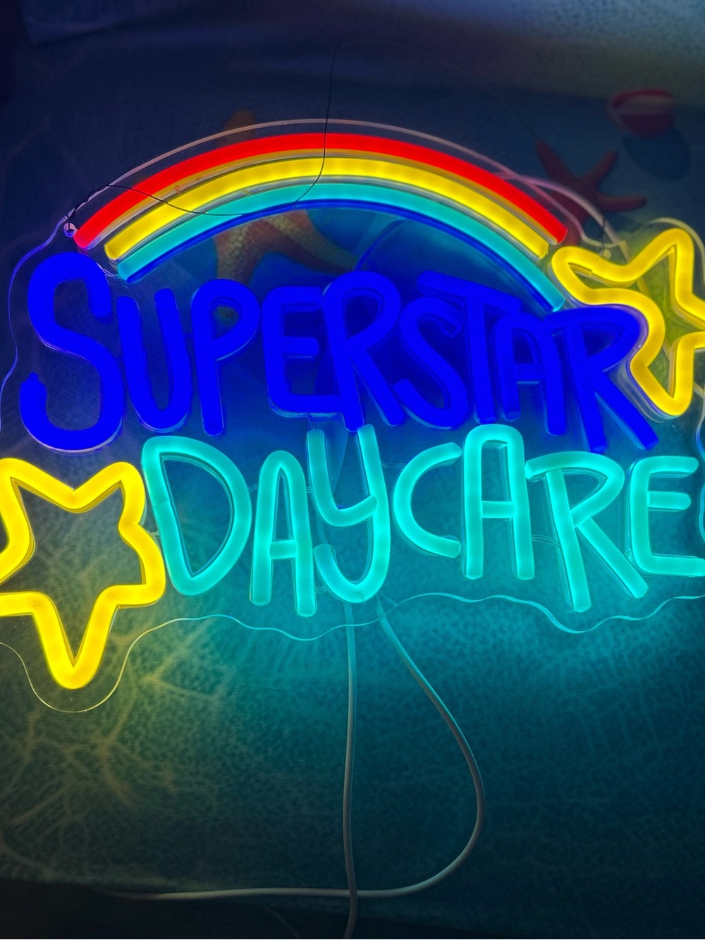 Neon 'Superstar Daycare' Sign - Blue, Teal, Yellow, Red